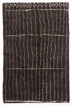 a brown rug with white lines on it