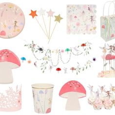 a collection of fairy themed items including cupcakes, cake and paper decorations on white background