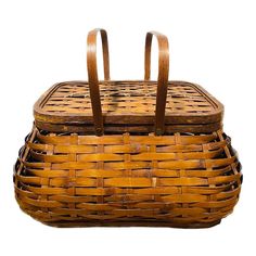 two wooden baskets sitting on top of each other