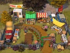 an aerial view of a small farm with lots of animals and people around it,