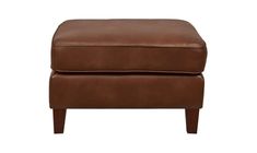 a brown leather foot stool with wooden legs