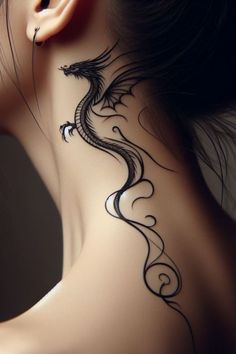 a woman's neck with a dragon tattoo on the back of her neck and behind her ear