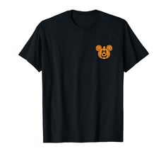 a black t - shirt with an orange mickey mouse patch on the front and back