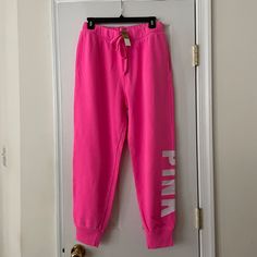 *Victoria's Secret Pink Fleece Joggers *New With Tags *Size: Medium *Color: Hot Pink *"Pink" Logo On Left Leg. *Adjustable Drawstring At Elastic Waistband. *Rib Cuff At Leg Opening. *Inseam: Approx. 27" *Relaxed Fit. *Victoria's Secret Sizing. Not Responsible For Actual Fit. Pink Sweatpants For Fall Loungewear, Fall Pink Sweatpants For Loungewear, Pink Stretch Sweatpants For Winter, Pink Joggers For Fall Loungewear, Pink Fall Joggers For Loungewear, Pink Winter Sportswear Sweatpants, Sporty Pink Pants For Fall, Victoria's Secret Pink Pants For Loungewear, Pink Sweatpants For Winter Loungewear