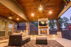 an outdoor living area with patio furniture and ceiling fan