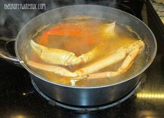 some food is cooking in a pot on the stove