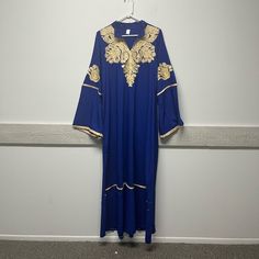 This Is A Boutique Item Never Worn. Beautiful Royal Blue With Embroidery Details And Bell Like Sleeves. Fits Size L/Xl Best With Measurements Of 21” Pit To Pit And Length 56”. Festive Long Sleeve Thobe With Floral Embroidery, Eid Floral Embroidered Tunic Abaya, Spring Blue Long Sleeve Abaya, Long Sleeve Embroidered Dabka Dress, Embroidered Long Sleeve Maxi Dress For Eid, Embroidered Blue Long Sleeve Abaya, Blue Long Sleeve Thobe For Eid, Festive Blue Maxi Dress With Floral Embroidery, Blue Abaya For Eid