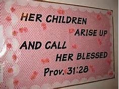 a sign on the wall that says, her children are up and call her blessed prov 31 28