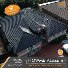 an aerial view of a house with roofing metals on the front and side