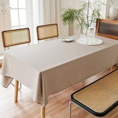 a dining room table with a place setting on it