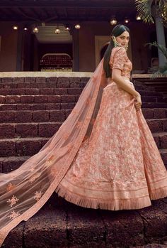 Latest Designer Bridal Wedding Wear Heavy Lehenga Choli. LEHENGA FABRIC: Georgette BLOUSE FABRIC: Georgette DUPATTA: Soft Net COLOR: Peach SIZE: upto 42 inches Bust and Waist WORK: Heavy Embroidery Bonus offer - Receive a free mystery gift with your order. Stitching Option - We will email you the measurement guide to confirm your size. SHIPPING: The product will be shipped within 1 - 2 weeks from the date of purchase. Product is returnable if un-Stitched This product qualifies for free shipping Lehengas Wedding, Peach Lehenga, Heavy Lehenga, Engagement Lehenga, Bridal Lehenga Online, Georgette Material, Bridesmaid Lehenga, Simple Lehenga, Resham Work