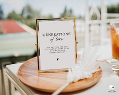 a table with a sign that says generations of love on it next to a drink