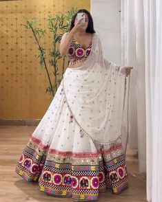 Luxury Women's Choli For Navratri, Cheap Embroidered Saree For Navratri, Luxury Self Design Saree For Navratri, Cheap Saree For Navratri Celebration, Luxury Festive Bottoms For Navratri, Cheap Chanderi Lehenga For Navratri, Luxury Chikankari Traditional Wear For Navratri, Luxury Shantoon Traditional Wear For Navratri, Luxury Semi-stitched Traditional Wear For Navratri