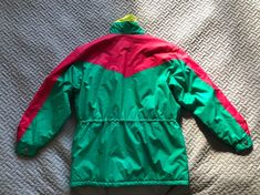 "Vintage Swedish men snow jacket with lots of pockets and adjustable waist. Bright colours, green, pink and yellow. Size - vintage men size 52 Measured flat- Shoulder seam to shoulder seam 58cm ( 23\") Underarm to underarm 65cm (25.5\") Sleeve length, from shoulder to edge 62cm ( 24.5\") Length 82cm (32\") It is in excellent vintage condition, looks like unused. Real colors may be little different from their appearance on your display. Pleas look at the pictures carefully. I will be happy to ans Green Ski Season Outerwear For Outdoors, Green Outerwear For Ski Season, Green Outerwear For Outdoor Ski Season, Vintage Green Outerwear For Hiking, Sporty Green Skiing Outerwear, Green Sporty Skiing Outerwear, Hooded Green Skiing Outerwear, Green Hooded Skiing Outerwear, Retro Green Outerwear For Outdoors