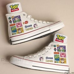 the shoes are decorated with cartoon characters on them