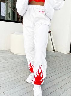 white sweatpants with red flames flamesCheck out the shop for more color options (pink, light blue, red, white, black)For any customizations, colors or sizing please feel free to message White Flames, Trendy Sweatpants, Cute Sweats, Red Flames, Red Sweatpants, Cute Sweatpants, White Sweatpants, Black Sweats, White Crewneck