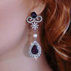 Bridal Earrings Amethyst Purple Crystal Dangle Drop Bride Wedding Accessory Teardrop Party Pageant Chandelier Weddings Jewelry Brides Gift Ready to Ship Amazingly Beautiful! Lots of Sparkle! Add a breathtaking touch to your wedding dress with this glamorous and one of a kind bridal earrings! Gorgeous and stunning, these silver plated bridal earrings are made with marvelous Austrian crystals. They would look fabulous for your wedding, prom, party and any special occasion. The earrings will defini Bachelorette Accessories, Bridal Floral Headpiece, Wedding Chandelier, Wedding Accessory, Bride Accessories, Purple Crystal, Wedding Headband, Headpiece Wedding, Amethyst Purple