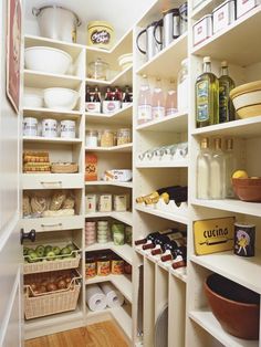 the pantry is stocked with many different types of food