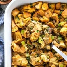 a casserole dish filled with chicken and vegetables