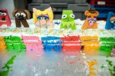 the cake is made to look like cartoon characters