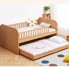 a child's bed with a pull out trundle