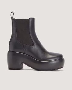 The Puffa Boot Black – Everlane Modern Chelsea Boots With Sculpted Heel, Leather Wedge Boots With Sculpted Heel And Round Toe, Leather Supplies, Boxy Sweater, Statement Shoe, We Made It, Best Practices, Leather Working, All You Need Is