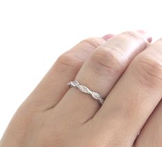 ◆IMPORTANT INFORMATION◆ This ring will arrive in a luxury gift box, accompanied by a blank card, care instructions, and a jewelry cleaning cloth. Our sterling silver rings are dipped in rhodium, to give them a lustrous white gold appearance, and to prevent discoloring and tarnish. Our commitment is to provide you with a high-quality piece of jewelry that you can wear forever. We proud ourselves in using only the finest stones in the market. Our flawless cubic zirconia stones have the same sparkl Wedding Hypoallergenic Stackable Rings With Round Band, Hypoallergenic Cubic Zirconia Wedding Rings, Hypoallergenic White Gold Wedding Rings, Adjustable Diamond Cut Ring As Gift, Adjustable Diamond Cut Diamond Ring As Gift, Stackable Eternity Band Ring As A Gift, Silver Eternity Band Ring As Gift, Silver Hypoallergenic Stackable Wedding Rings, Silver Diamond Cut Eternity Band As Gift