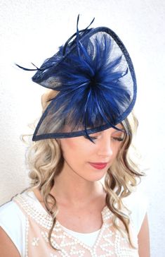 The Taylor sinamay fascinator is beautifully shaped to add some volume to your style while remaining light, comfortable and easy to wear. Attaches with a matching satin headband. English Hats, Navy Blue Fascinator, Tea Hats, Derby Fashion, Blue Fascinator, Sinamay Fascinator, Womens Tea, Party Crafts, Tea Party Hats