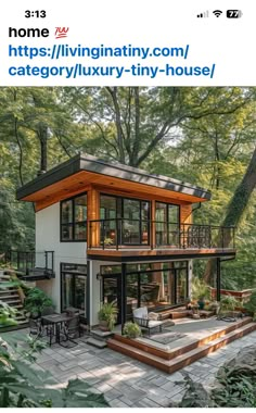 an image of a modern house in the woods