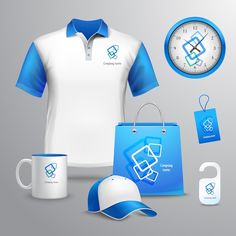 a white and blue shirt, hat, mug, clock and other items are on display