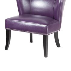 a purple leather chair with studded legs