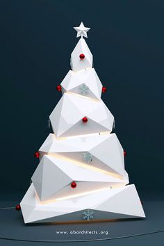 an origami christmas tree with red and white ornaments on it's sides