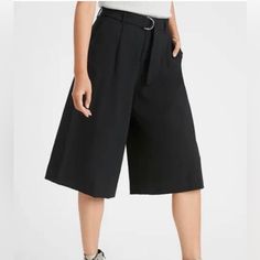 Our Version Of Culottes, This Pair Has Double Pleating Details At The Front And Back To Add Extra Movement To This Wide-Leg Silhouette. Crafted In A Blend Of Luxuriously Soft, Lightweight, And Eco-Friendly Tencel. Zip Fly With Hook-And-Bar Closure. Belted Waist. Pleated Front. Unlined. #603069 67% Tencel (Lyocell), 33% Polyester. Machine Wash Cold, Gentle Cycle, Tumble Dry Low, Cool Iron. Imported. Wide-Leg Fit: High-Rise (11.75"). Straight Through The Hip And Thigh With A Very Wide Leg. Cropped Casual Culottes With Belt Loops, Casual High Waist Culottes With Belt Loops, Casual High-waist Culottes With Belt Loops, Black Belted Wide Leg Bottoms, Casual Black Culottes For Work, Casual Belted Bottoms For Night Out, Versatile Black Culottes For Work, Black Belted High Waist Wide Leg Pants, High Waist Casual Culottes For Workwear