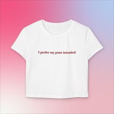 For the clever and witty, this I Prefer My Puns Intended baby tee is a fun nod to those who appreciate wordplay. Featuring a comfortable, cropped fit and vintage-inspired style, this tee is perfect for casual wear or adding a quirky touch to your everyday wardrobe. Whether you're a pun enthusiast or just love a good laugh, this shirt will quickly become a favorite. Features: - Soft and breathable fabric - Slim fit baby tee design - Bold pun graphic: "I Prefer My Puns Intended" - Perfect for pun Funny Baby Tees, Pun Shirts, Baby Tees, Baby T Shirts, Statement Tees, Baby T Shirt, Funny Baby, Everyday Wardrobe, Baby Tee