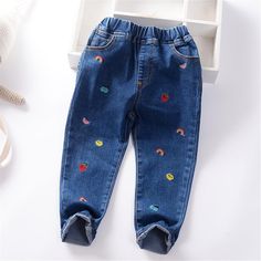 Girls Cartoon Solid Color Casual Jeans Wholesale - PrettyKid Winter Blue Denim Pants, Blue Non-stretch Jeans With Elastic Waistband, Cute Cotton Pants For Winter, Cute Winter Cotton Pants, Playful Denim Blue Bottoms For Spring, Stretch Denim Blue Bottoms For Winter, Blue Cotton Pants For Fall, Playful Denim Blue Bottoms, Non-stretch Blue Winter Pants