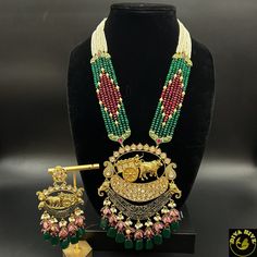 High Quality Kundan Meena Enameled bridal set Contains: Choker with Earing and Maangtika, Long Necklace with Earing Nickel Free Polish: Gold Figure: Bull cart Color: Ruby, Green Traditional Hand Set Chandbali Sets, Multicolor Hand Set Festive Sets, Festive Multicolor Hand Set Sets, Festive Multicolor Hand Set, Traditional Meenakari Sets For Celebration, Temple Jewelry Sets With Cutdana For Eid, Meenakari Sets For Navratri Celebration, Navratri Celebration Meenakari Sets, Traditional Meenakari Bridal Sets For Celebration