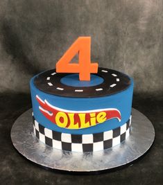 a birthday cake with the number four on it