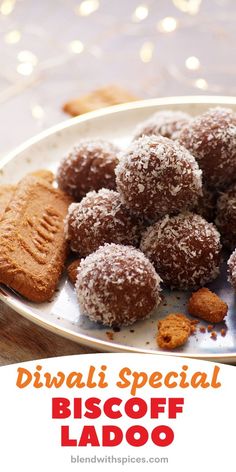 a white plate topped with cookies and powdered sugar