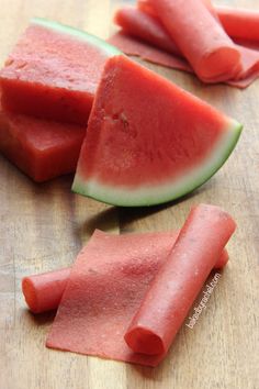 slices of watermelon on a wooden cutting board