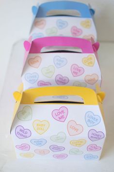 three boxes that have hearts on them