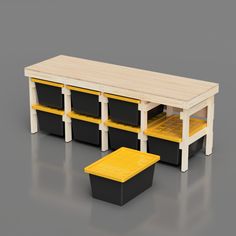 a wooden table with black and yellow bins on the bottom, and two stools below it