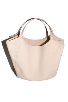 Same day shipping on Modern Weaving. Heavy and durable duck canvas carryall made of 100% cotton. Vegan tan straps, inner pocket, and natural canvas lining. Large Capacity Beige Canvas Bucket Bag, Large Canvas Bucket Bag For Shopping, Spacious Beige Canvas Bucket Bag, Large Capacity Bucket Canvas Bag, Cream Canvas Shoulder Bag With Double Handle, Beige Cotton Hobo Bag For Travel, Large Capacity Cream Bucket Canvas Bag, Beige Hobo Bag With Canvas Lining For Travel, Beige Weekender Bag With Large Capacity And Double Handle