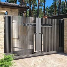 an iron gate in front of a house