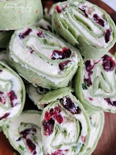 there are many rolls with cranberry fillings on the top one is rolled up