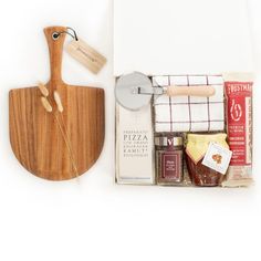 When in doubt, pizza is always a good idea! Our signature ‘Pizza Night’ is not merely a gift box - it’s an experience. It’s the perfect gift for families and essentially anyone looking to enjoy an evening in the kitchen. Makes a perfect engagement or wedding gift, housewarming gift, or even as a standout corporate gift for your clients and employees. FREE U.S. SHIPPING + COMPLIMENTARY HANDWRITTEN NOTECARD ~section 2~ GIFT CONTENTS: Magnetic-Closure Gift Box; Wood Pizza Paddle; Organic Pizza Mix; Gourmet Pizza Seasoning; Pomodoro Pizza Sauce; Small-Batch Pepperoni; Beechwood Pizza Slicer; Set of 2 Tea Towels; Neutral Fill; Letterpressed Calligraphy Gift Tag; Double-Sided Ribbon; Dried Natural Greenery for a Finishing Touch! A NOTE ABOUT SUBSTITUTIONS: We pride ourselves on supporting small- Pizza Basket Ideas Gift, Pizza Gift Basket, Pizza Slicer, Calligraphy Gift Tags, Wood Pizza, Bridal Party Groomsmen, New Pizza, Corporate Holiday Gifts, Gourmet Pizza