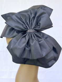 Embrace the essence of glamour with our exquisite 3 layer black bows, beautifully crafted with a 13in x 12in bottom black bow,  10in x 10in middle black bow and a chic 10in x 8in black bow artfully layered on top.  This captivating combination exudes elegance and allure, perfect for making a bold fashion statement.  Secured with a shimmering silver rhinestone closure, the design adds a touch of luxury to the ensemble.  Comfortably nestled on a 13in x 3/4in headband, our exclusive bows are though Black Bows, Black Elegance, Silver Rhinestone, Black Bow, Artisan Craft, Hair Accessories Headbands, Bold Fashion, Mother Daughter, African Fashion