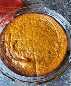 a cake sitting on top of a glass plate