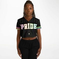 Pride Cropped Jersey | Love is Love Cropped Jersey Show up in style with this cropped baseball jersey. This top is a must-have for any modern fashionista. The chic design is casual yet trendy, making it a perfect addition to your wardrobe essentials. Designed with versatility in mind, the jersey’s lightweight moisture-wicking fabric will keep you cool during game days and hot summer nights out with friends. Plus, it has a button front closure that makes it very easy to wear. • 100% polyester • S Sporty Crop Top For College In Spring, Varsity Top With Baseball Collar For Game Day, Sporty Tops With Graphic Print And Baseball Collar, Trendy Short Sleeve Pride Top, Trendy Crew Neck Top For Pride, Trendy Short Sleeve Tops For Pride, College Tops With Graphic Print And Baseball Collar, College Graphic Print Top With Baseball Collar, Baseball Collar Tops For Summer Streetwear