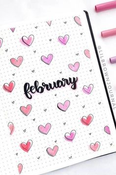 a notebook with hearts on it and the word february written in cursive writing