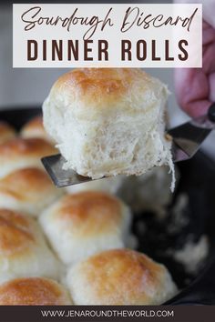 a person holding a piece of bread over a skillet with the words sourdough biscuit dinner rolls on it